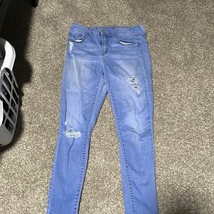 Light wash jeans, worn in with no new wholes or damage.